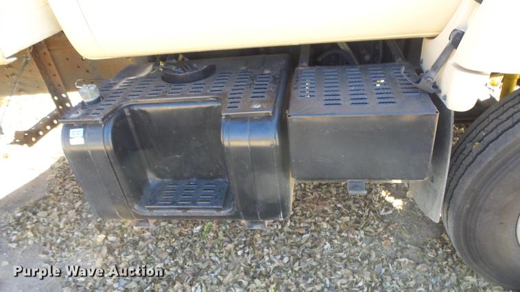 image for item DE7318 1997 GMC C7500 flatbed truck with fish transporter