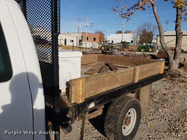 image for item AV9491 2001 Ford F250 Super Duty SuperCab flatbed pickup truck