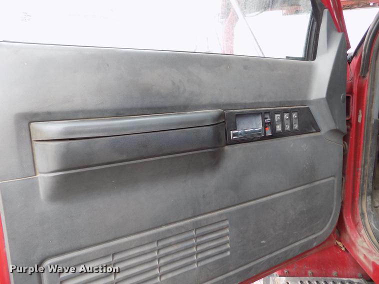 image for item DB9069 1991 GMC TopKick SL rollback truck