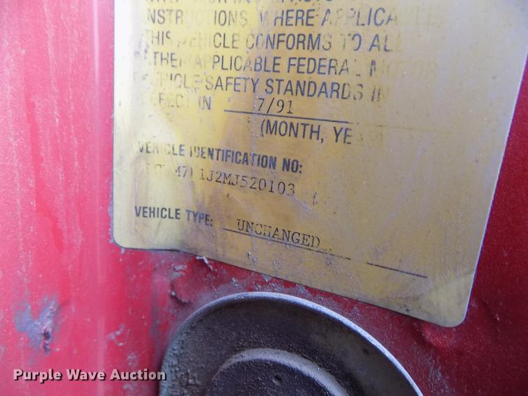 image for item DB9069 1991 GMC TopKick SL rollback truck