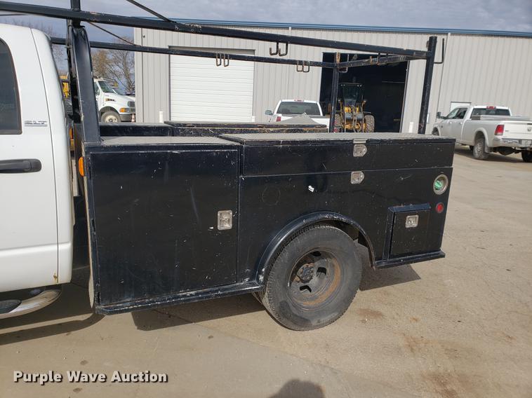 image for item DB9409 2008 Dodge Ram 3500 Quad Cab utility bed pickup truck