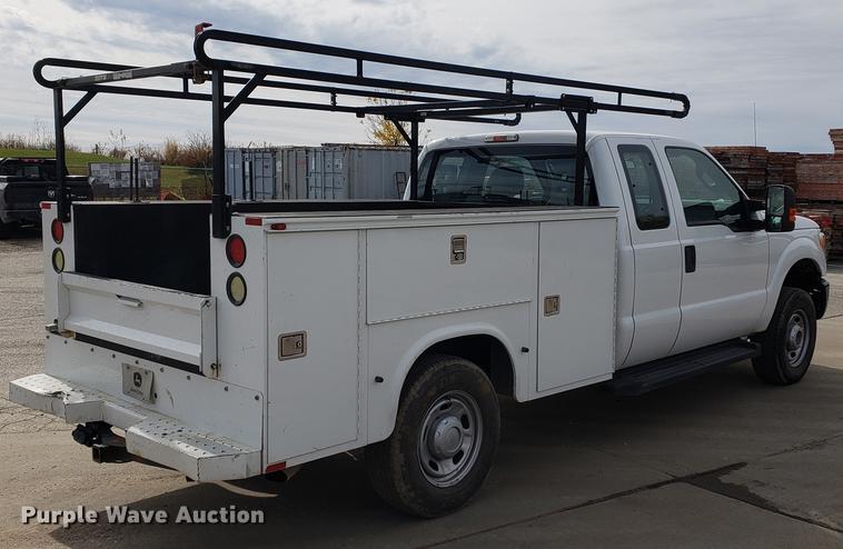 image for item DB9411 2013 Ford F250 Super Duty utility bed pickup truck