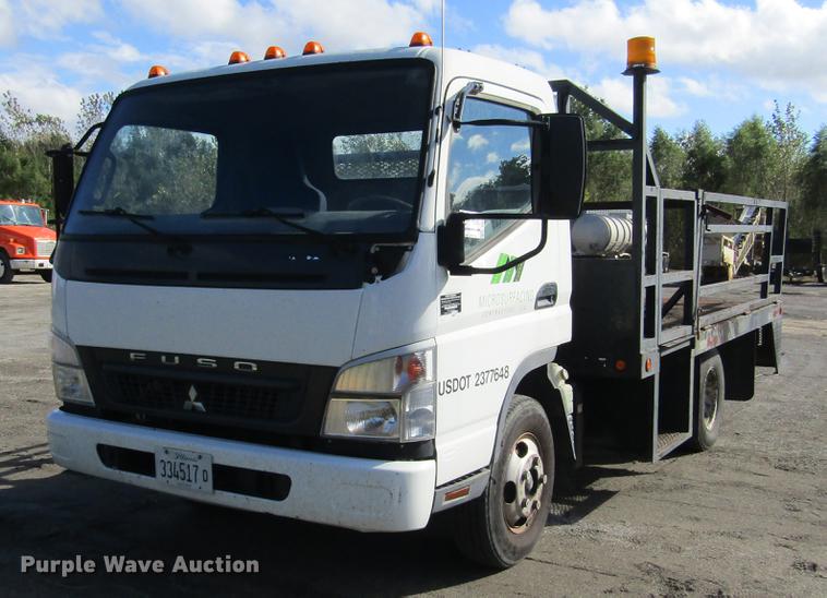 image for item DD2669 2008 Mitsubishi Fuso FE125 flatbed truck