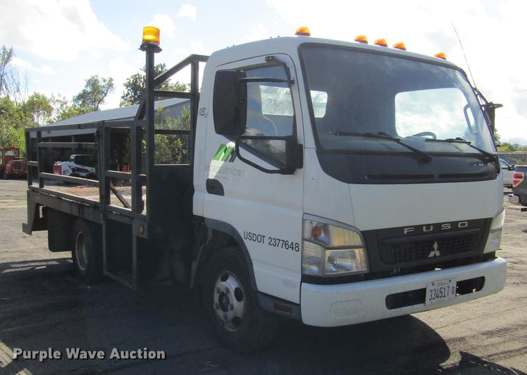 image for item DD2669 2008 Mitsubishi Fuso FE125 flatbed truck