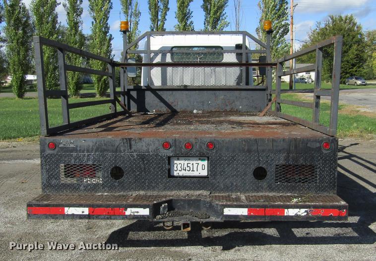 image for item DD2669 2008 Mitsubishi Fuso FE125 flatbed truck