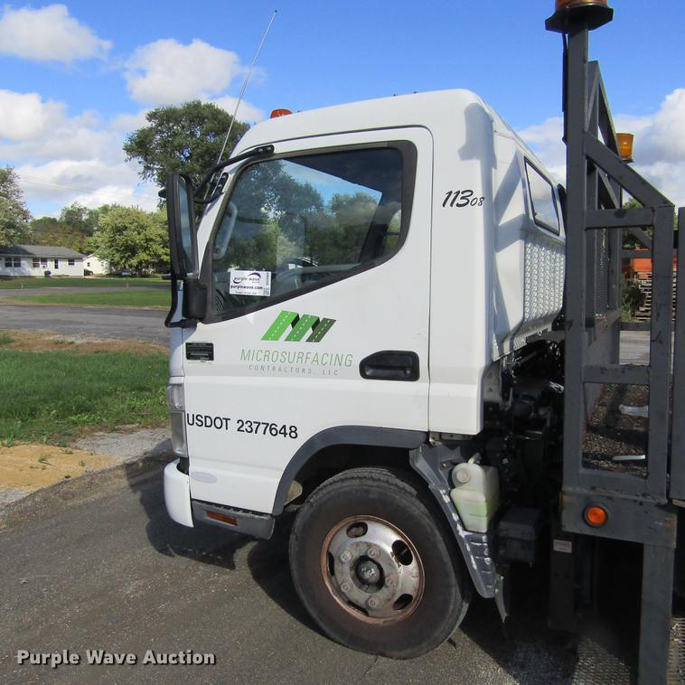 image for item DD2669 2008 Mitsubishi Fuso FE125 flatbed truck