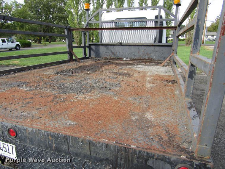 image for item DD2669 2008 Mitsubishi Fuso FE125 flatbed truck