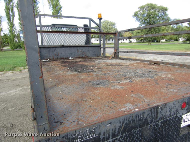 image for item DD2669 2008 Mitsubishi Fuso FE125 flatbed truck