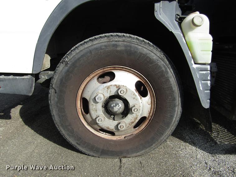 image for item DD2669 2008 Mitsubishi Fuso FE125 flatbed truck