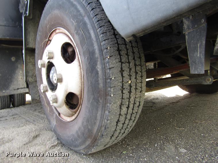 image for item DD2669 2008 Mitsubishi Fuso FE125 flatbed truck