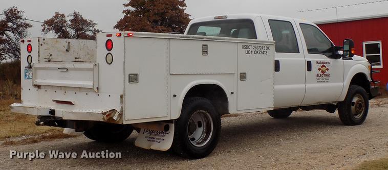 image for item DD3513 2013 Ford F350 Super Duty Crew Cab utility bed pickup truck