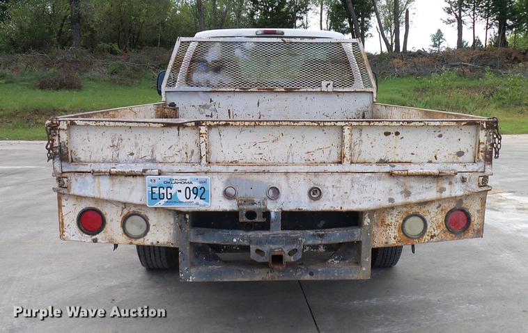 image for item DD5941 2003 Ford F250 Super Duty flatbed pickup truck