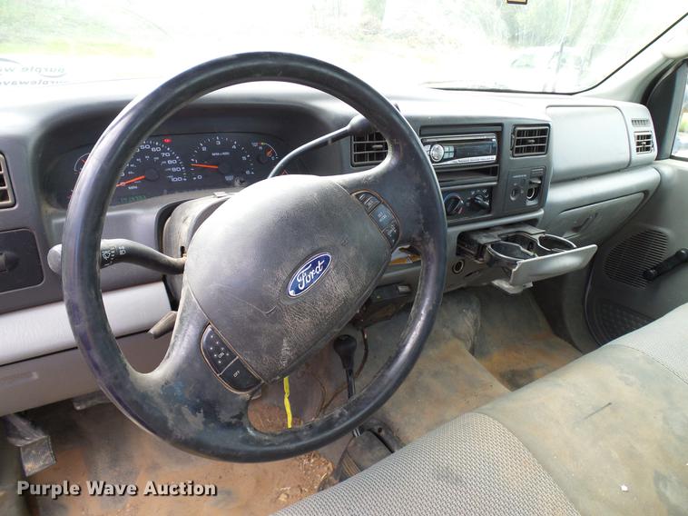 image for item DD5941 2003 Ford F250 Super Duty flatbed pickup truck