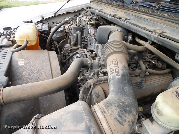 image for item DD5941 2003 Ford F250 Super Duty flatbed pickup truck