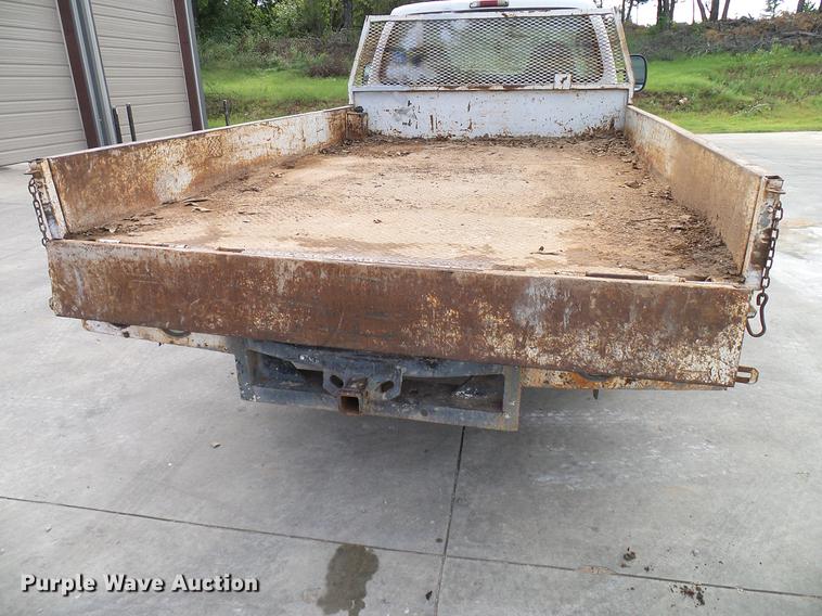 image for item DD5941 2003 Ford F250 Super Duty flatbed pickup truck