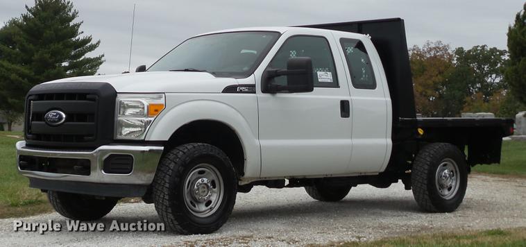 image for item DE4917 2012 Ford F250 Super Duty XL SuperCab flatbed pickup truck