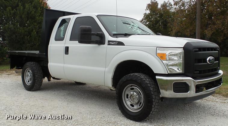 image for item DE4917 2012 Ford F250 Super Duty XL SuperCab flatbed pickup truck