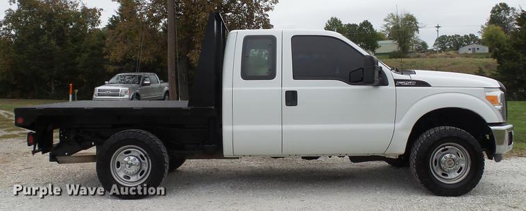 image for item DE4917 2012 Ford F250 Super Duty XL SuperCab flatbed pickup truck