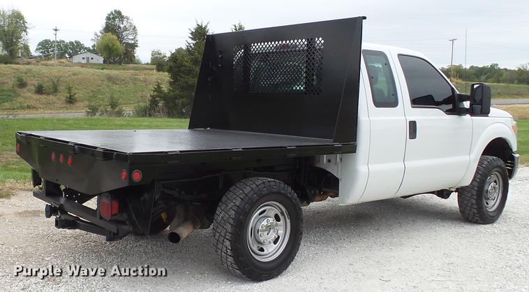 image for item DE4917 2012 Ford F250 Super Duty XL SuperCab flatbed pickup truck