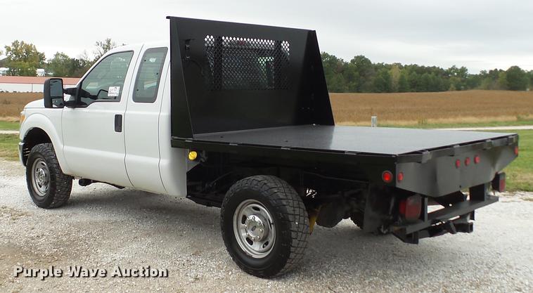 image for item DE4917 2012 Ford F250 Super Duty XL SuperCab flatbed pickup truck