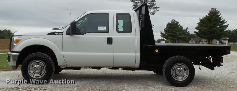 image for item DE4917 2012 Ford F250 Super Duty XL SuperCab flatbed pickup truck