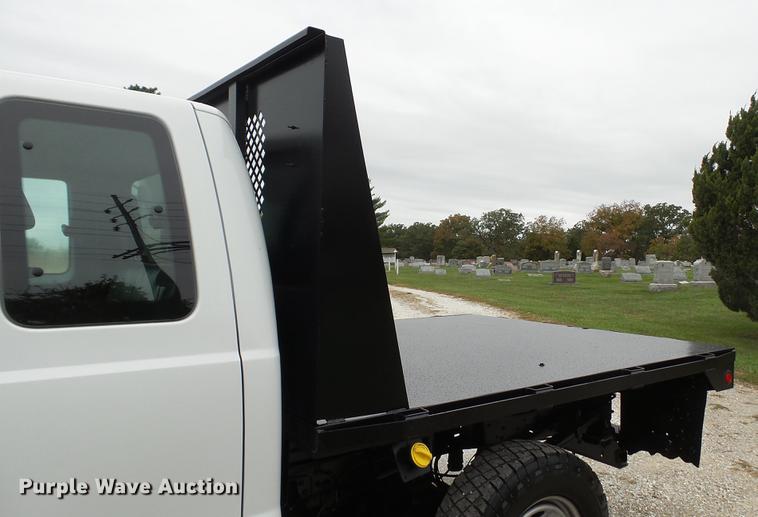 image for item DE4917 2012 Ford F250 Super Duty XL SuperCab flatbed pickup truck