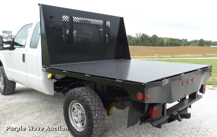 image for item DE4917 2012 Ford F250 Super Duty XL SuperCab flatbed pickup truck