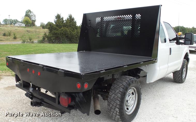 image for item DE4917 2012 Ford F250 Super Duty XL SuperCab flatbed pickup truck