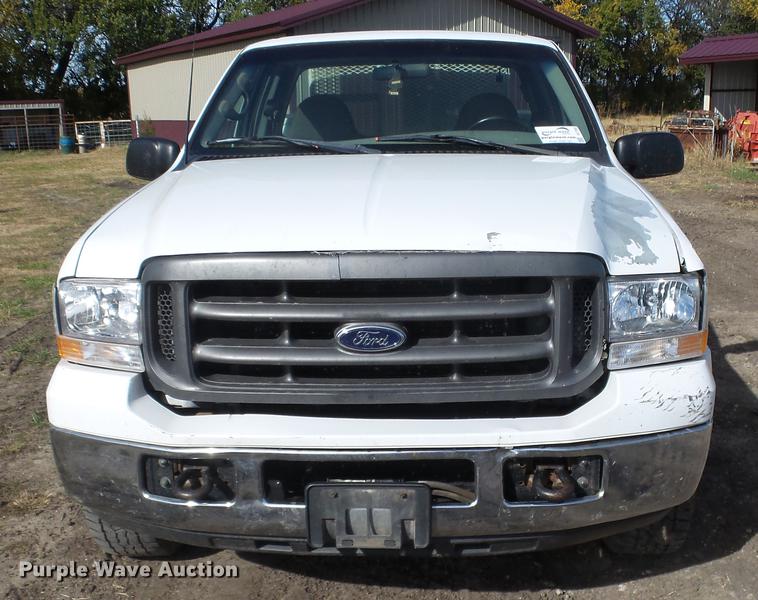 image for item DE7302 2002 Ford F250 Super Duty SuperCab utility bed pickup truck