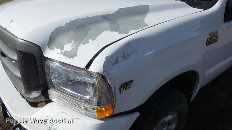 image for item DE7302 2002 Ford F250 Super Duty SuperCab utility bed pickup truck