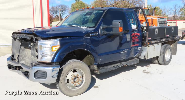 image for item DF1288 2011 Ford F350 Super Duty SuperCab flatbed pickup truck