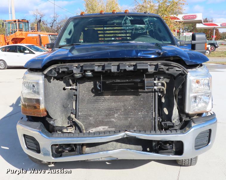 image for item DF1288 2011 Ford F350 Super Duty SuperCab flatbed pickup truck