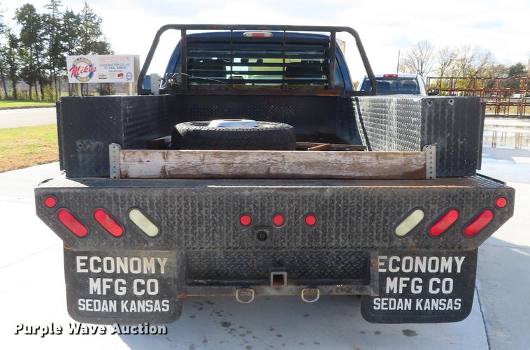 image for item DF1288 2011 Ford F350 Super Duty SuperCab flatbed pickup truck