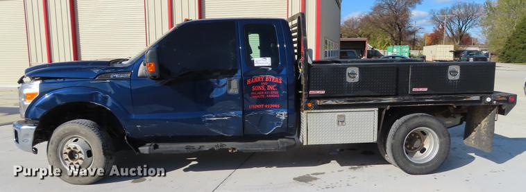 image for item DF1288 2011 Ford F350 Super Duty SuperCab flatbed pickup truck