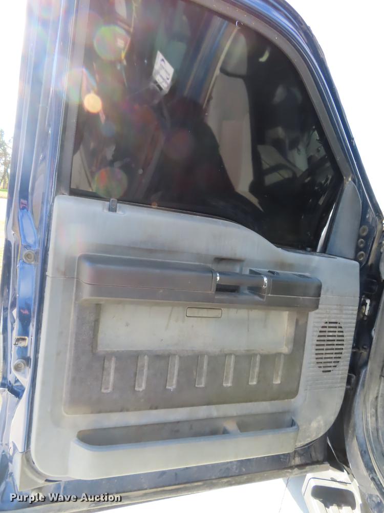 image for item DF1288 2011 Ford F350 Super Duty SuperCab flatbed pickup truck