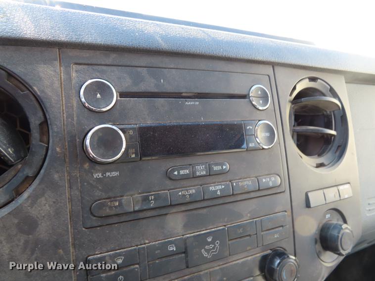 image for item DF1288 2011 Ford F350 Super Duty SuperCab flatbed pickup truck