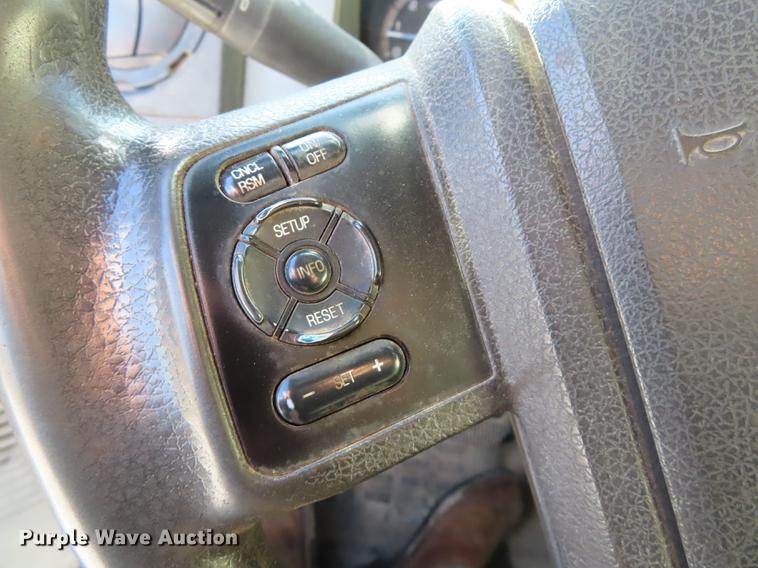 image for item DF1288 2011 Ford F350 Super Duty SuperCab flatbed pickup truck