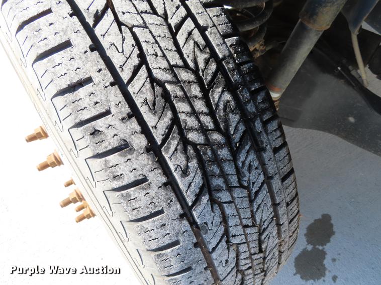 image for item DF1288 2011 Ford F350 Super Duty SuperCab flatbed pickup truck