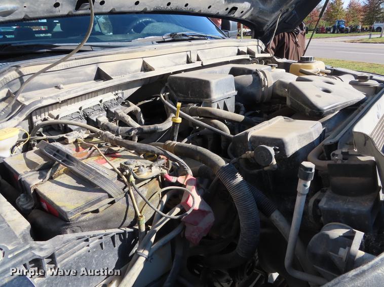 image for item DF1288 2011 Ford F350 Super Duty SuperCab flatbed pickup truck