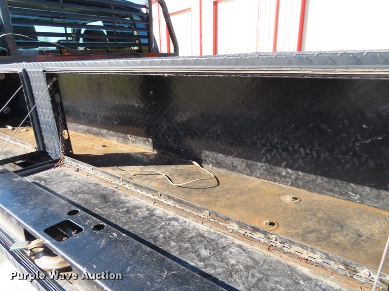 image for item DF1288 2011 Ford F350 Super Duty SuperCab flatbed pickup truck