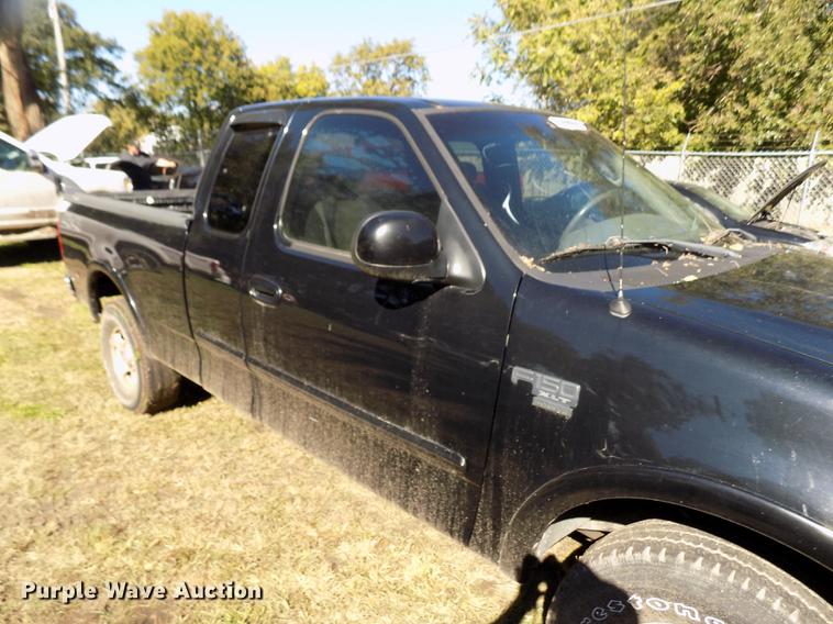 image for item DY9084 2003 Ford F150 XLT SuperCab pickup truck