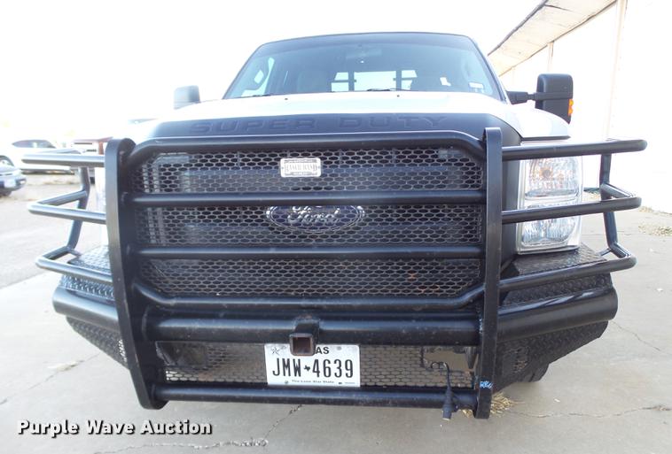 image for item EN9656 2013 Ford F350 Super Duty SuperCab flatbed pickup truck