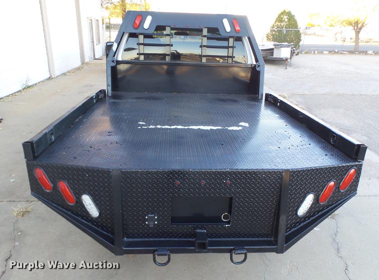image for item EN9656 2013 Ford F350 Super Duty SuperCab flatbed pickup truck