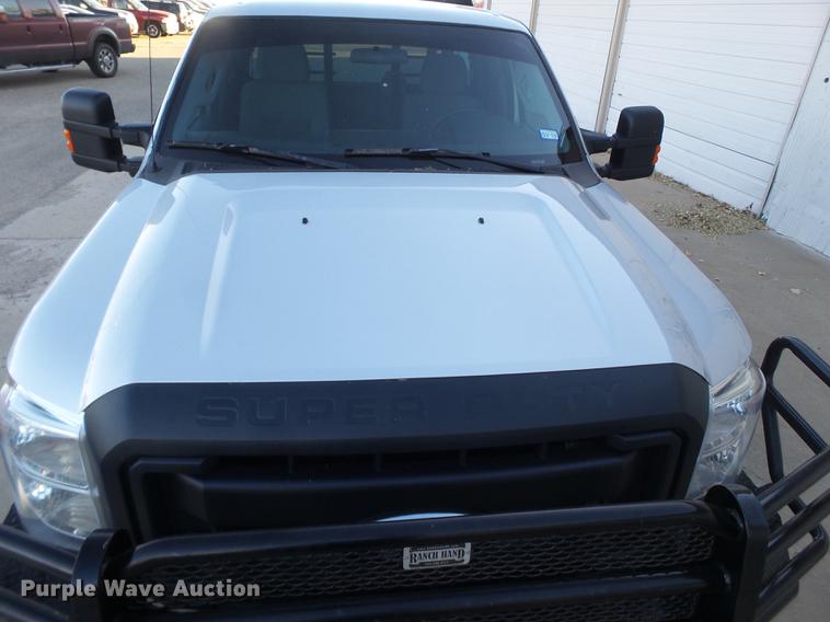 image for item EN9656 2013 Ford F350 Super Duty SuperCab flatbed pickup truck