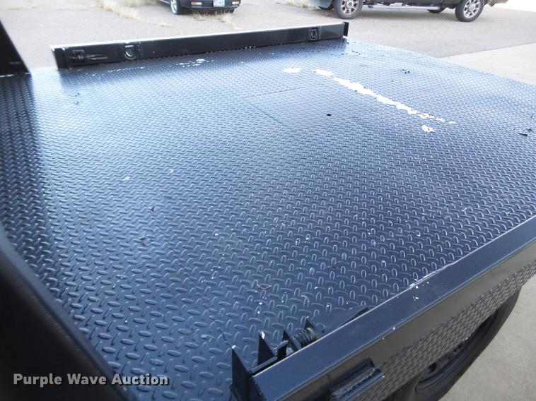 image for item EN9656 2013 Ford F350 Super Duty SuperCab flatbed pickup truck