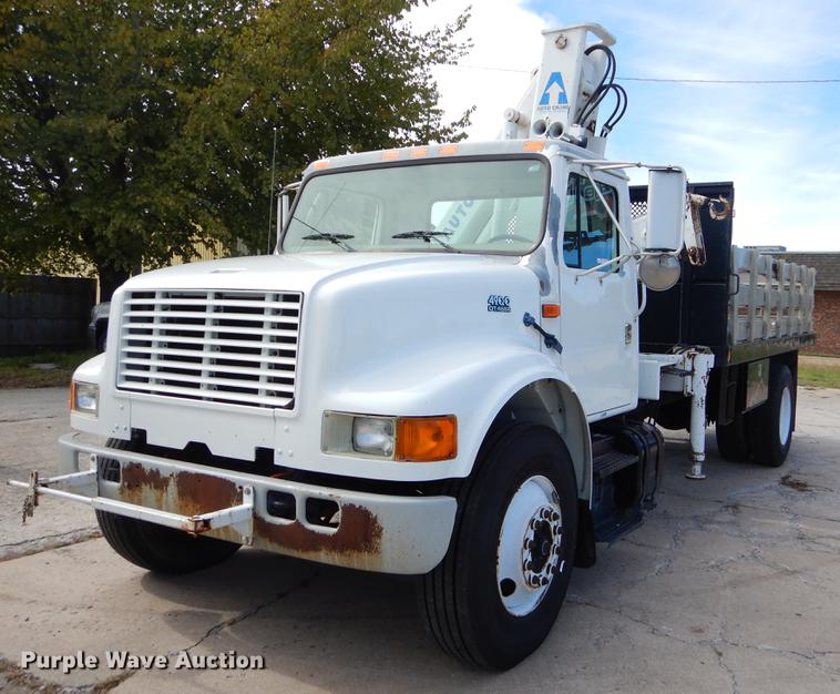 image for item EO9713 2002 International 4900 flatbed truck with Auto Crane
