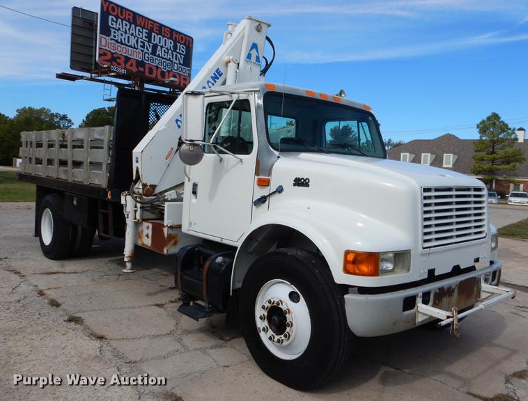 image for item EO9713 2002 International 4900 flatbed truck with Auto Crane