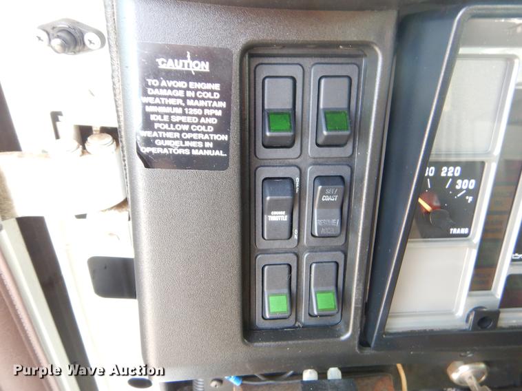 image for item EO9713 2002 International 4900 flatbed truck with Auto Crane