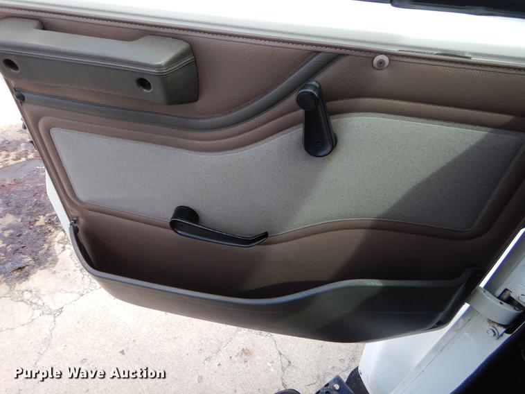 image for item EO9713 2002 International 4900 flatbed truck with Auto Crane