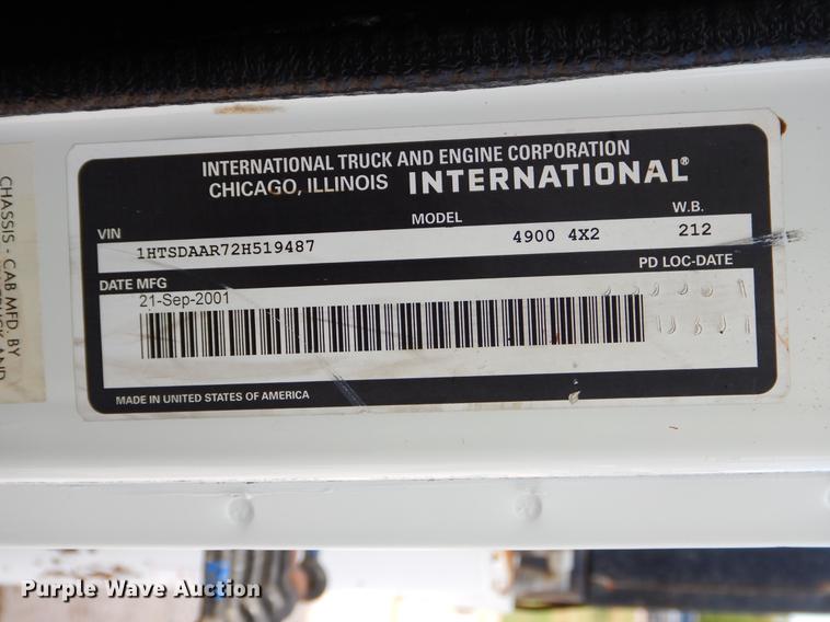 image for item EO9713 2002 International 4900 flatbed truck with Auto Crane